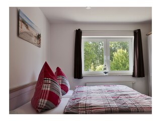 Schlafzimmer mit Doppelbett