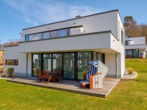Ferienhaus Haus Wetterhexe in Sellin - WG 1 strandnah mit Kamin - Sellin - image1