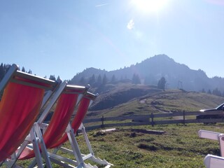 Grüntenhütte mit Sicht auf den Gipfel