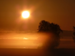 Sonnenaufgang, vom Wintergarten aus beobachtet