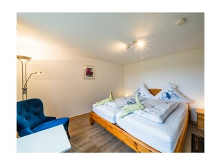 Schlafzimmer mit Sitzbereich