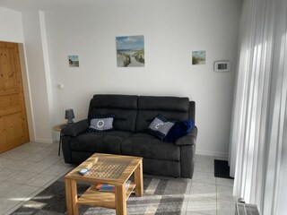 Relaxsofa mit elektrisch ausfahrbarem Fußteil