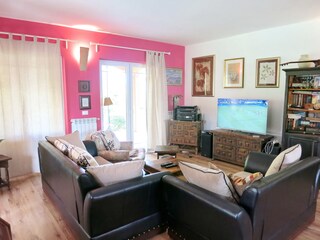 Livingroom with Sat-TV and exit to the Terace