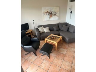 Ecksofa mit Lederliegesessel