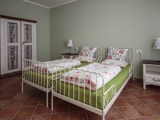 Bedroom with two single beds