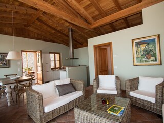 Living room with kitchen, overlooking Lake Garda.