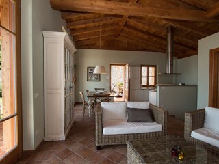 Living room with kitchen, overlooking Lake Garda.