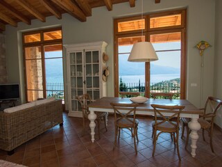 Living room with kitchen, overlooking Lake Garda.