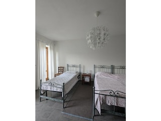 Bedroom 1 with 3 beds