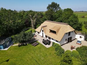 Ferienhaus Reetdachhaus Friesen Chalet - Tating - image1