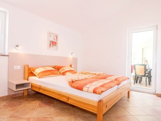 Bedroom 1 with Doublebd and Exit to Balcony