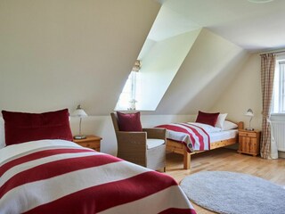 Das dritte Schlafzimmer ist mit zwei Einzelbetten ausgestattet.