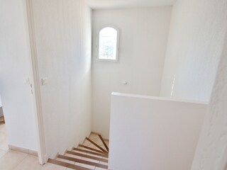 Staircase to floor with bedrooms