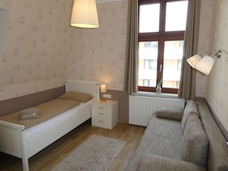 Schlafzimmer mit Schlafcouch