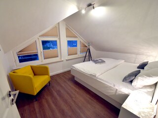 Schlafzimmer mit Ankleidezimmer