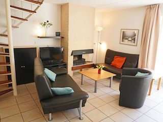 Wohnzimmer mit Kamin