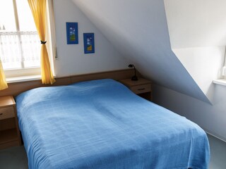 Schlafzimmer mit Doppelbett  im OG