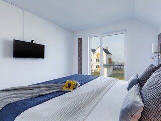 Masterbedroom mit 32 Zoll Smart TV