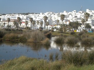 Conil, Stadtansicht vom Strand aus
