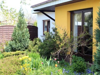 Charmantes Ferienhaus inmitten eines schönen Gartens