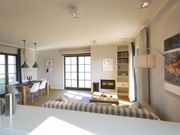 Ferienhaus Strandnahe Premium- Reetdachvilla mit Wasserblick