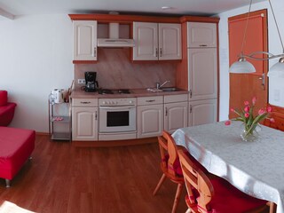 Livingroom with kitchen and eatingplace