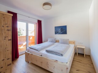 Schlafzimmer mit Balkon