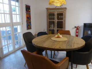 Dining area with view of terrace and garden