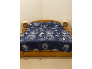 Schlafzimmer mit Doppelbett Apartment A