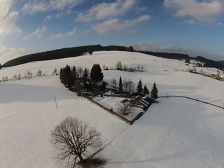 Eschach 111 im Winter - im Hintergrund die Skilifte