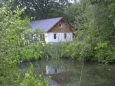 Ferienhaus mit Teich