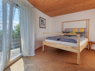 Schlafzimmer mit Balkon