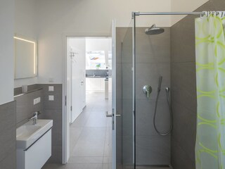 Bathroom no. 2 with a walk-in shower and toilet