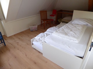 Schlafzimmer mit Ausziehbett