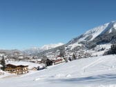 Blick von Piste aufs Haus