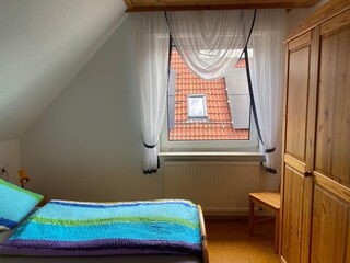Das Schlafzimmer mit 2 Einzelbetten