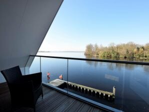 Villa Prachtige chalet met  ligplaats in Kaag direct aan het meer - Warmond - image1