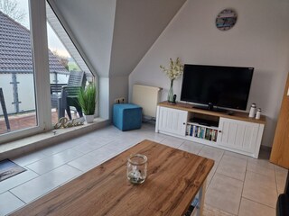 Wohnzimmer mit Balkon