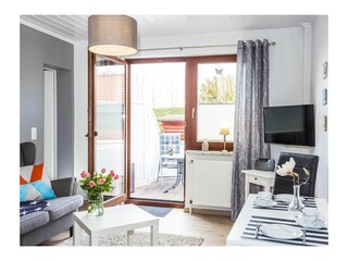 Wohnzimmer / Essbereich mit Zugang zur Terrasse