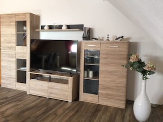 Wohnbereich mit internetfähigem TV, WLAN