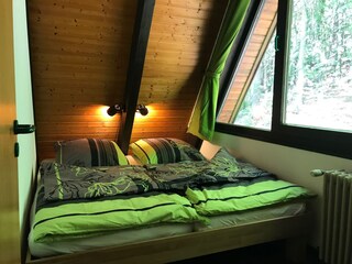 Bedroom on the forest side of the house.