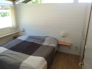 Bedroom with a double bed. Plenty of space in closets