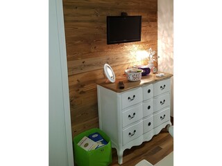 Bedroom with satellite TV, DVD player, and double bed