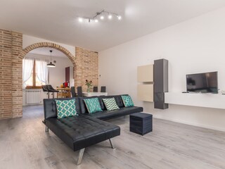 Bright living room with sofa.