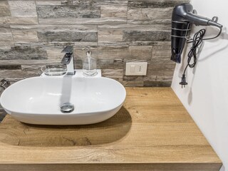Sink with hairdryer.