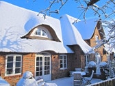 Friesenhaus Skap üüb strun im Winter