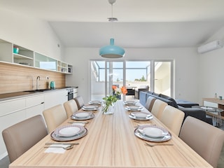 Living room. Dining table, kitchen