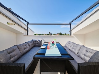 Terrace with lounge with awning