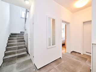 Apartment entrance to rooms, stairs to the Livingrooom