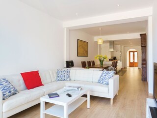sitting-/ dining room with open kitchen